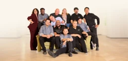 Team von Imhoff Essen bei einem gemeinsamen Gruppenfoto in moderner Location